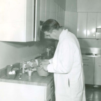 Dr. Lendal Kotschevar making instant mashed potatoes.