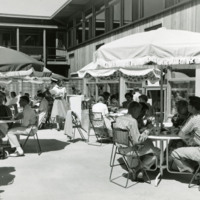 Students dining on the patio outside the Lodge.